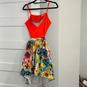 RaeLynn’s boutique neon floral cutout mini dress 💐